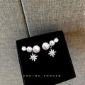 Silver Tone White Pearl And Clear Stone Starburst Stud Earrings view 4