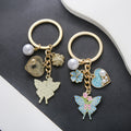 Three-Color Heart Pearl Rose and Butterfly Enamel Keychain Collection view 2