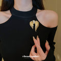 Gold Tone Asymmetrical Angel Wing Brooch With Clear Crystals view 3