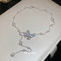 Silver Tone Butterfly Necklace with Pearl Look Stations and Drop view 4
