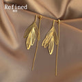 Gold Openwork Wing Long Chain Drop Earrings Dual Panel view 1
