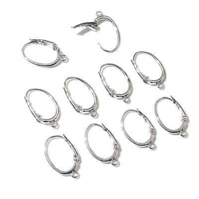 Overview of silver-tone oval hinged hoop findings with small bottom attachment loops on a light background