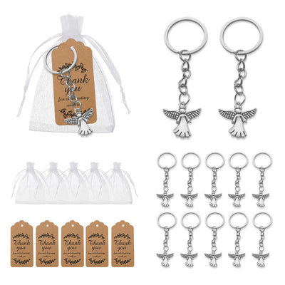 Angel keychains displayed with white drawstring bags and brown thank-you tags.