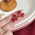 Four Red Gold and Silver Rocking Horse Stud and Dangle Earrings view 2