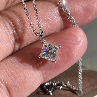 Product view 1 showing small square clear stone in a raised setting