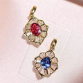 Floral Halo Pendant Necklace In Blue And Red Stone Options view 3