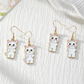 White Enamel Cat Drop Earrings in Three Selectable and Random Options view 1
