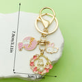Easter Bunny Charm Keychains Featuring Pink Flower Across 19 Pictured Variations view 4