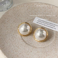 Large White Pearl Gold Rim Circular Stud Earrings Pair view 3