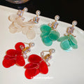 Pearl Effect Crystal Petal Drop Earrings In Three Colors view 3