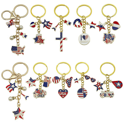 Front display of ten Fourth of July patriotic enamel keychains with visible colors and attached hardware