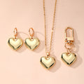 Gold Tone Puffy Heart Necklace Earrings and Clip Keychain view 5