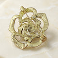 Camellia Flower Brooch In Metal With Openwork Black Enamel Petals, Crystals, And A view 4