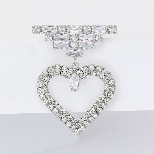 Close-up product view showing the colors and surface details of the crystal open heart drop brooch