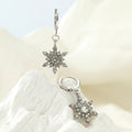 Silver Six Point Snowflake Crystal Look Huggie Earrings view 1