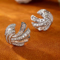 White Gold Multi Layer Swirl Baguette CZ Stud Earrings view 2