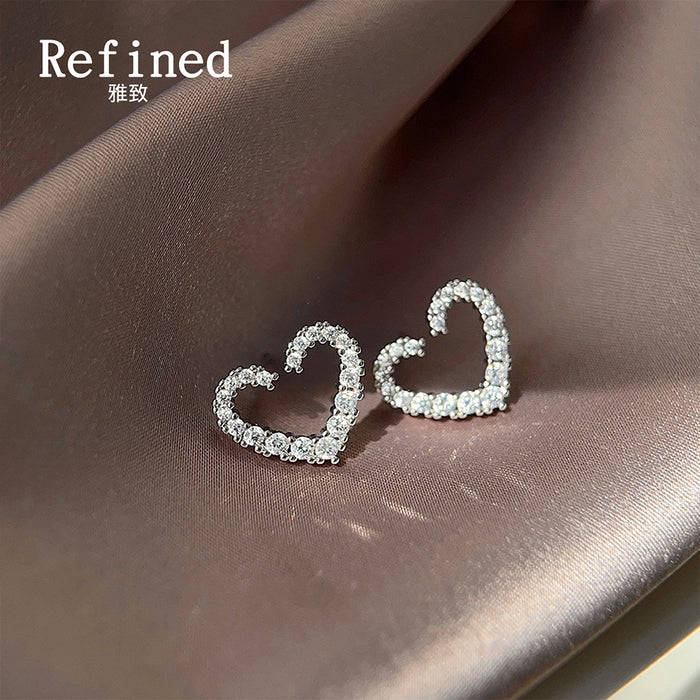 Silver Tone Hollow Heart Stud Earrings with Clear Crystal Pave