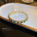 Gold Tone Open Cuff Bracelet With Green And Clear Crystal Rows view 4