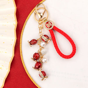 Mixed Red Firecracker Flower Strawberry and Suitcase Fortune Keychains