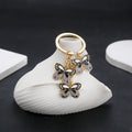 Black Butterfly Enamel Charm Keychain with Gold Tone Hardware view 6