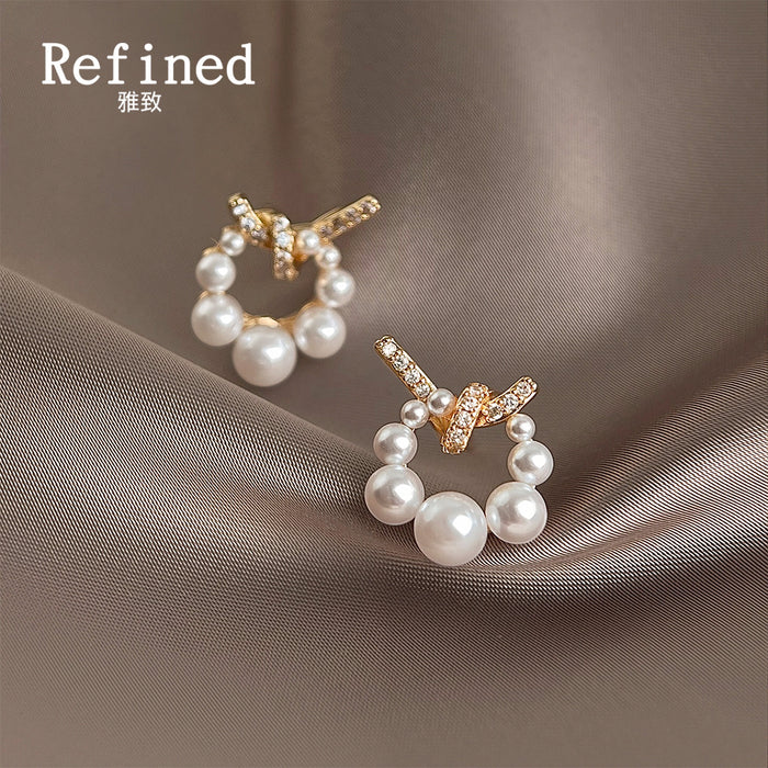 Gold Tone Clear Stone Bow And White Pearl Circle Stud Earrings