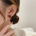 Burgundy Enamel Heart Stud Earrings Gold Tone Metal Rim view 3