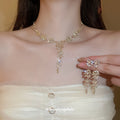Gold Tone Wheat Leaf Crystal Necklace And Long Earring Set view 4