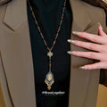 Brown Beaded Necklace with Ornate Eye Teardrop Pendant view 3