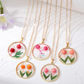 Gold Tone Round Raised Tulip Pressed Flower Resin Necklaces view 1