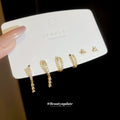 Minimal Gold Tone Stud And Huggie Earring Set Jewelry Design view 4