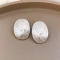 Textured Oval Pearl Stud Earrings in Gold and Silver Tone view 2