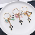 Six Color Piano Violin Headphone and Music Note Keychains view 4