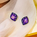 Purple Diamond Shape Crystal Stud Earrings Dark Metal Blue Rim view 3
