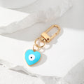 Gold Tone Heart Enamel Evil Eye Clip Keychains in Six Colors view 7