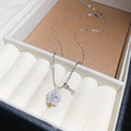 Silver Pearl Flower Crystal Huggie Earrings and Pendant Necklace view 7