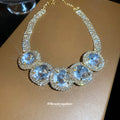 Five Crystal Medallion Collar Necklace With Polished Metal Tone Details view 2