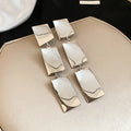Long Folded Rectangle Drop Earrings in Gold and Silver Tone view 2