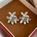Sculpted Flower Stud Earrings in Gold and Silver Tones view 7