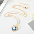 Gold Tone Crystal Open Heart Realistic Eye Pendant Necklaces view 2