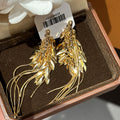 Gold Wheat Leaf and Chain Fringe Drop Earrings With Metal Details view 2