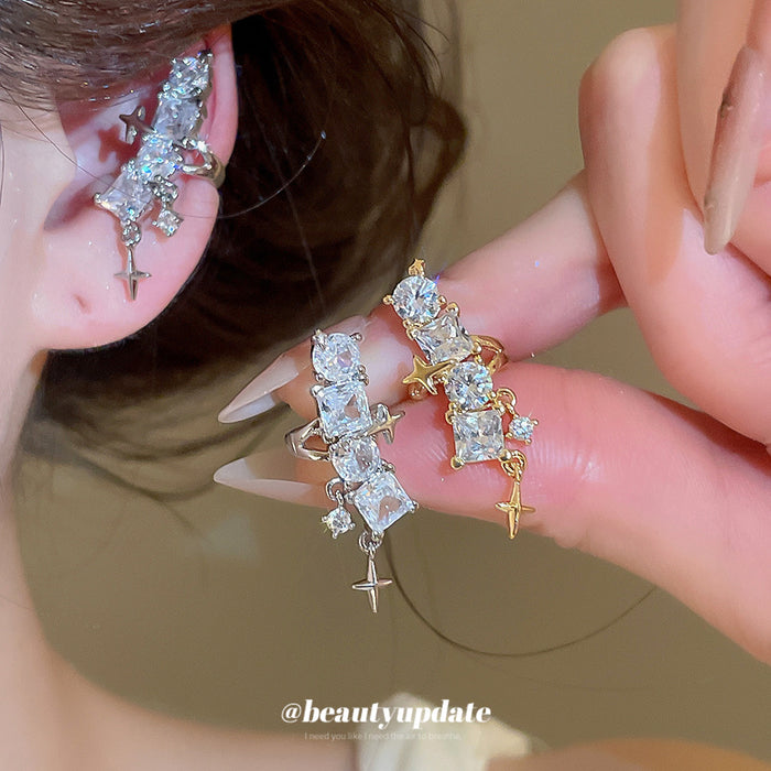 Crystal Star Dangle Single Ear Clips with Polished Metal Tone Details
