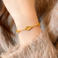 Gold Tone Open Gourd And Floral Teardrop Link Chain Bracelet view 1