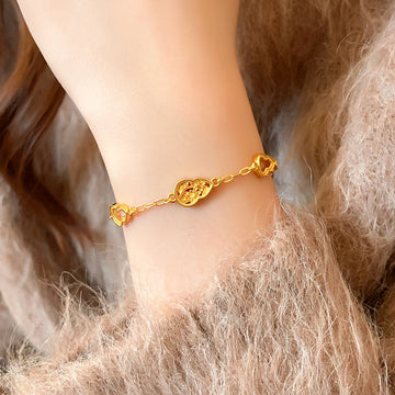 Gold Tone Open Gourd And Floral Teardrop Link Chain Bracelet