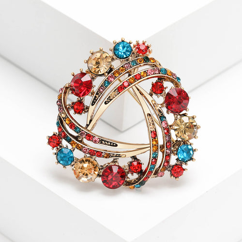 Angled product view showing the brooch surface details