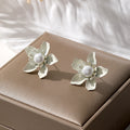 Pearl Centered Layered Metal Flower Stud Earrings in Five Colors view 4