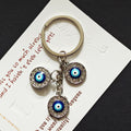 Triple Round Rhinestone Blue Evil Eye Keychains in Two Finishes view 7
