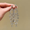 Long Crystal Chandelier Earrings in Gold and Silver Tones view 4