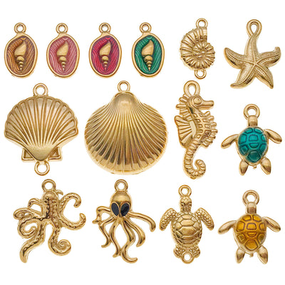 Gold-tone starfish and seahorse charms arranged on a light background