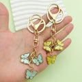 Butterfly Charm Keychains Featuring Blue Butterfly Across 35 Pictured Variations view 3