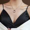 Twisted Cross Circle Ring Pendant Necklace In Gold Or Steel view 7